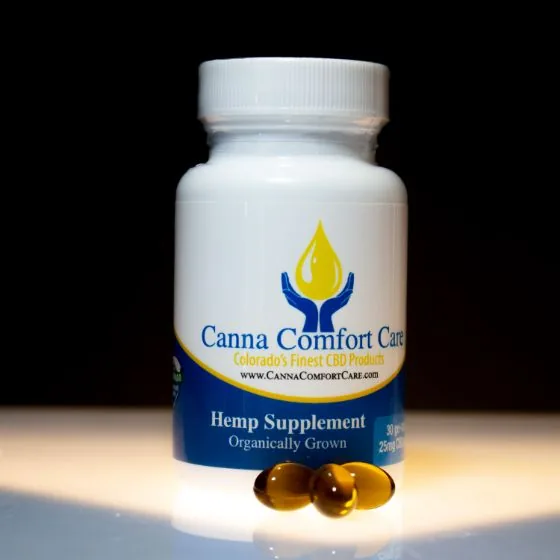 Canna Comfort Care hemp supplement bottle and gel tabs, product photo by Jeremy Benisek.